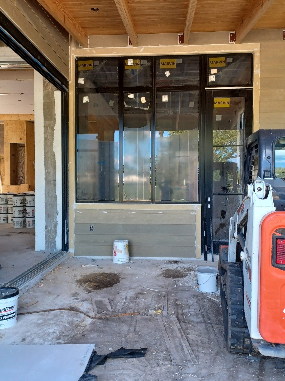 New sliding glass door opening framed into an exterior wall